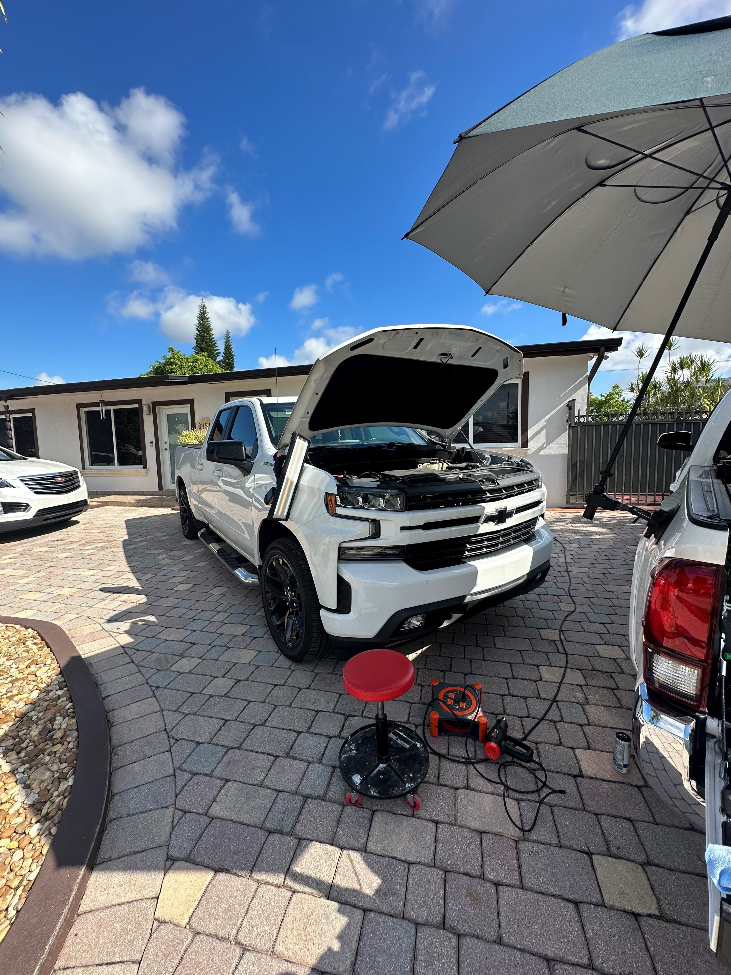 Body crease paintless dent repair result, Miami
